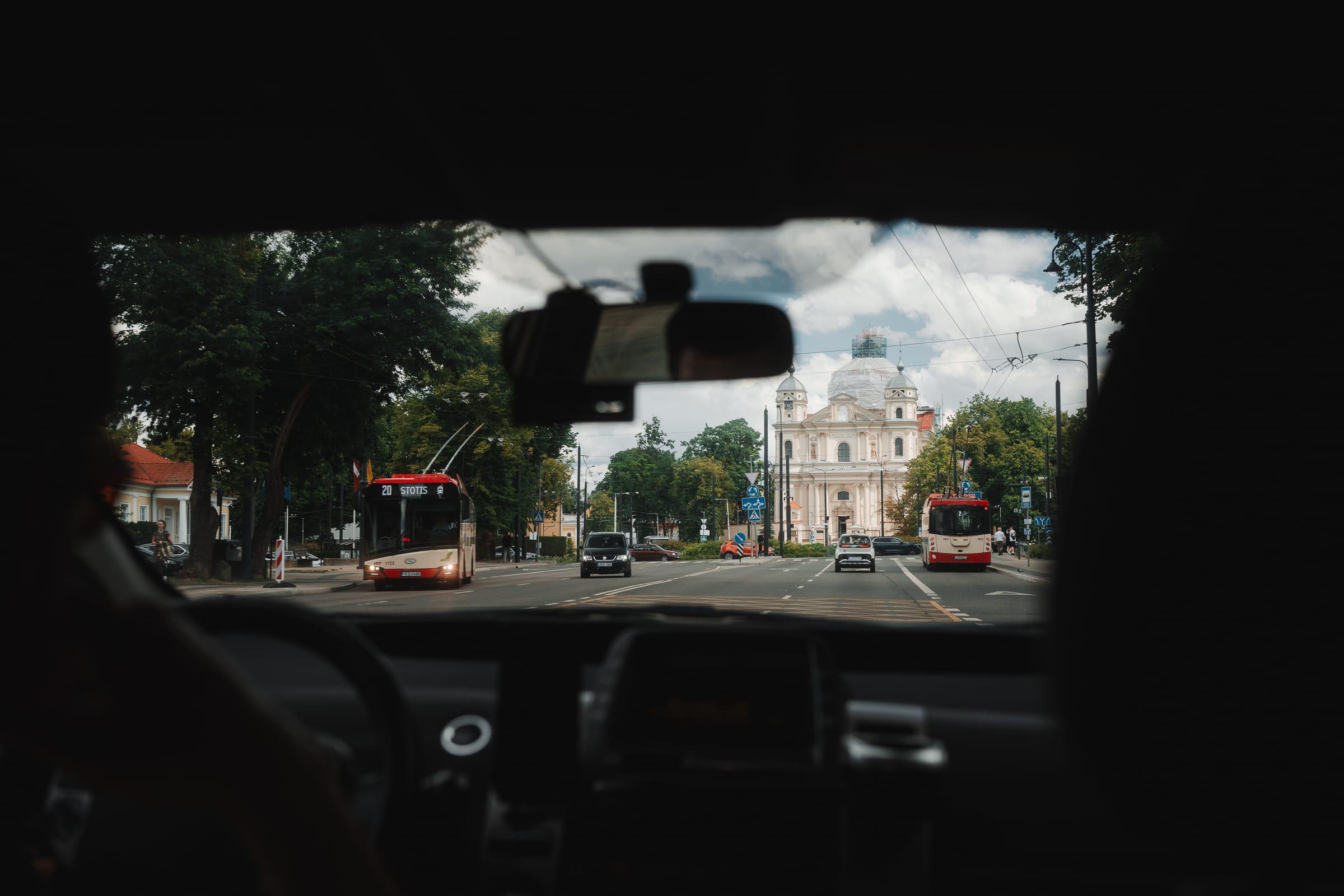 Vilnius through a windscreen between setups, trolleybuses either side