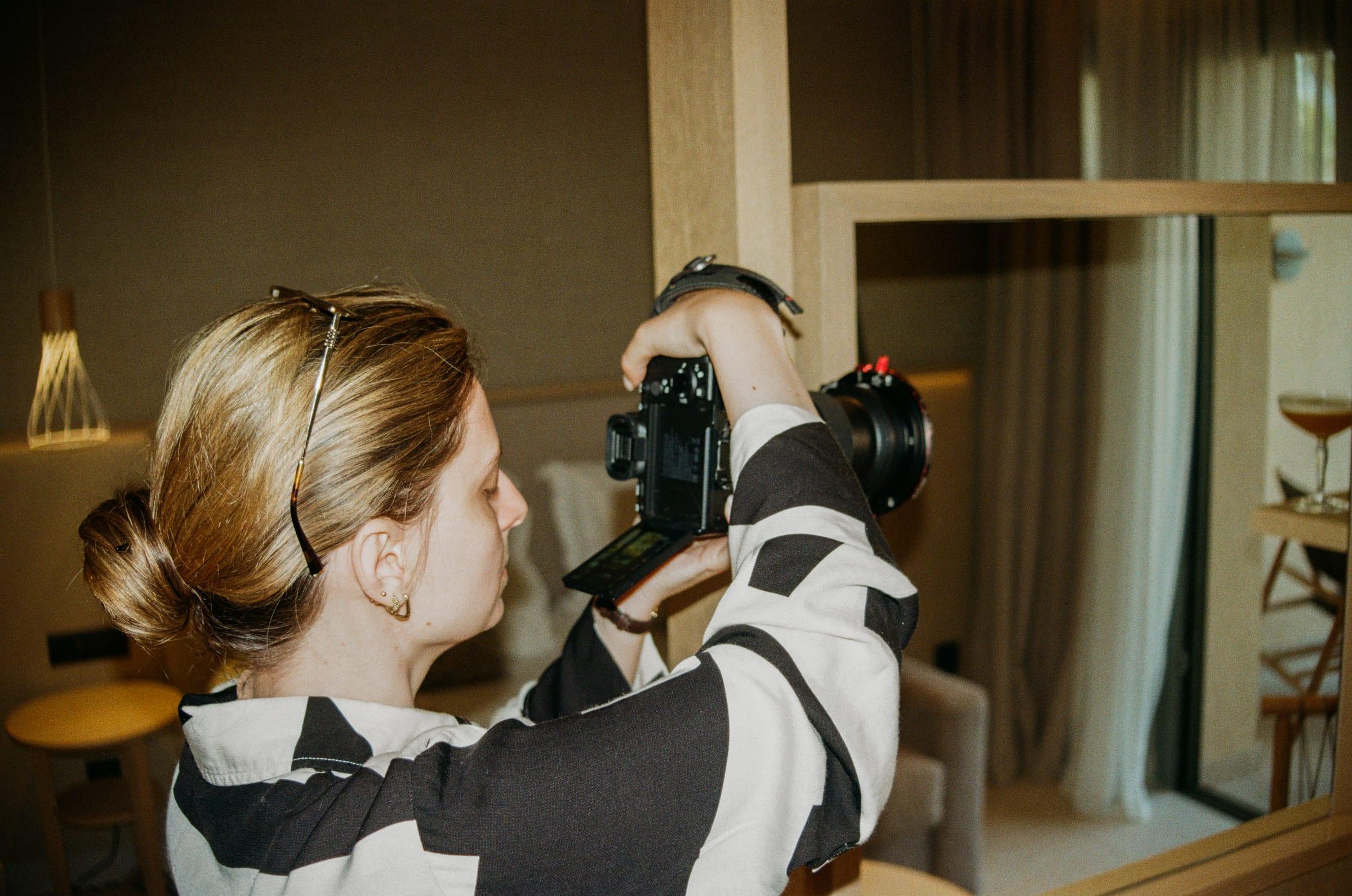Working the room off the mirror, camera up and the suite doubled behind