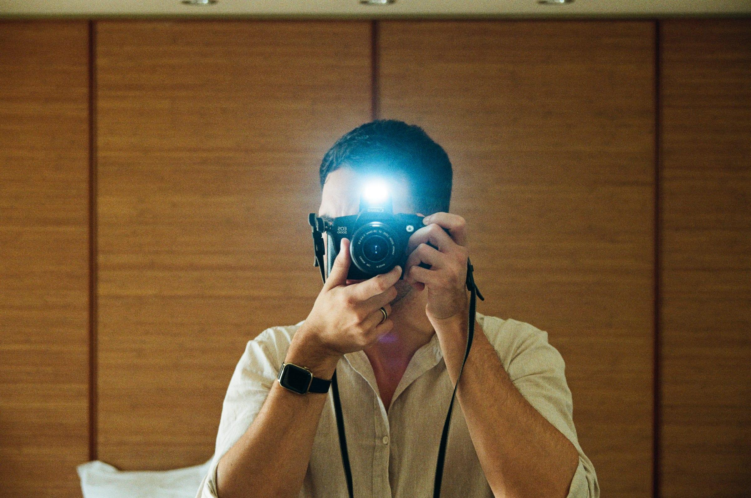 The flash going off into the mirror, everything but the timber gone white